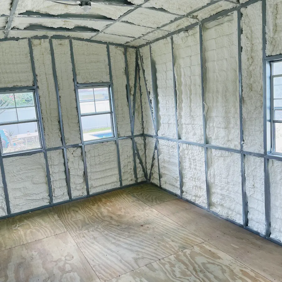 Closed-cell spray foam insulation applied to wall cavities in a residential project in Charlotte